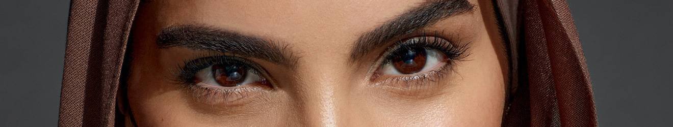 Maybelline Brow products illustrative banner image - Close up of a woman's Eyes and Eyebrows
