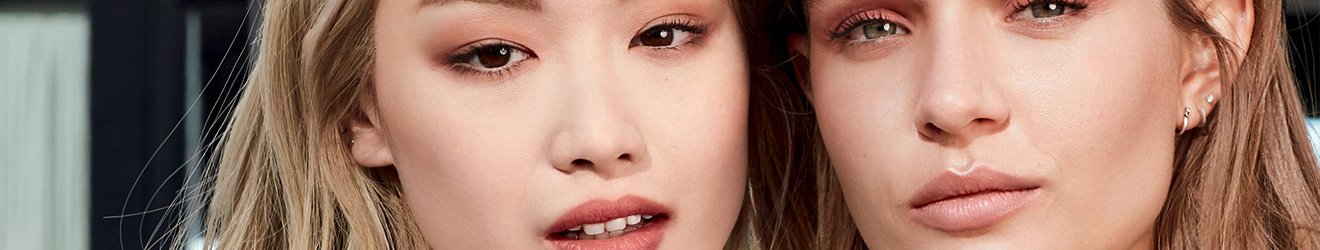 Maybelline Face Makeup products illustrative banner image - Close up of two blond models